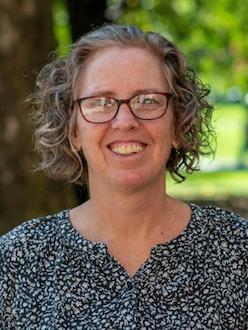 Becky Mansfield in black and white patterned blouse
