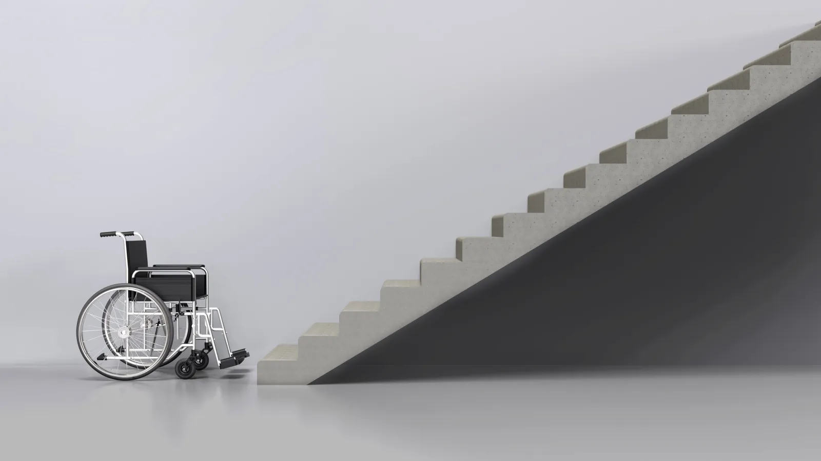 Wheelchair against white background in front of set of stairs