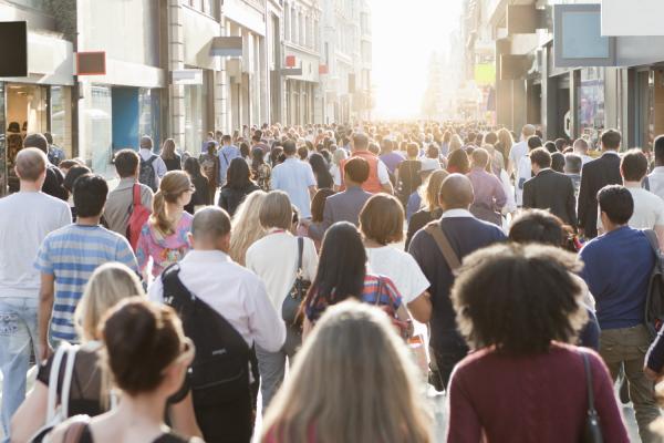 well-being image of individuals on crowded urban street