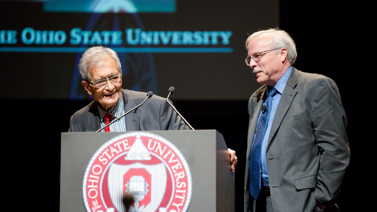 Amartya Sen at podium before inaugural CEHV lecture